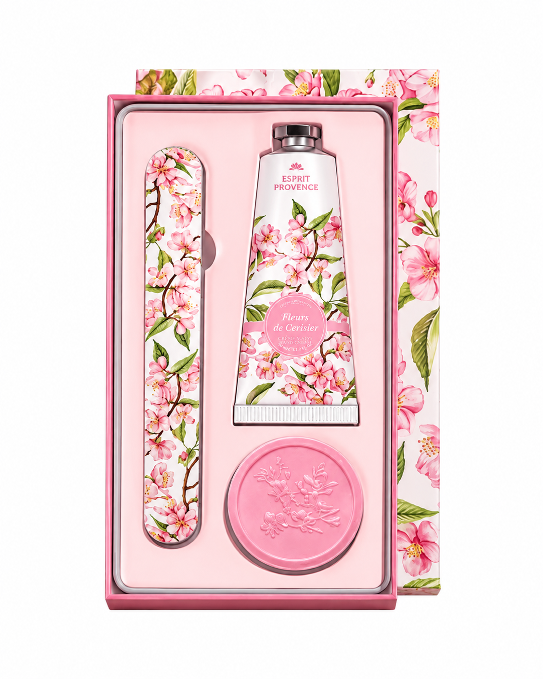 Coffret soins des mains, au parfum de Fleurs de Cerisier, signé Esprit Provence. Il réunit un savon, une lime à ongles et une crème dans un jolie coffret.