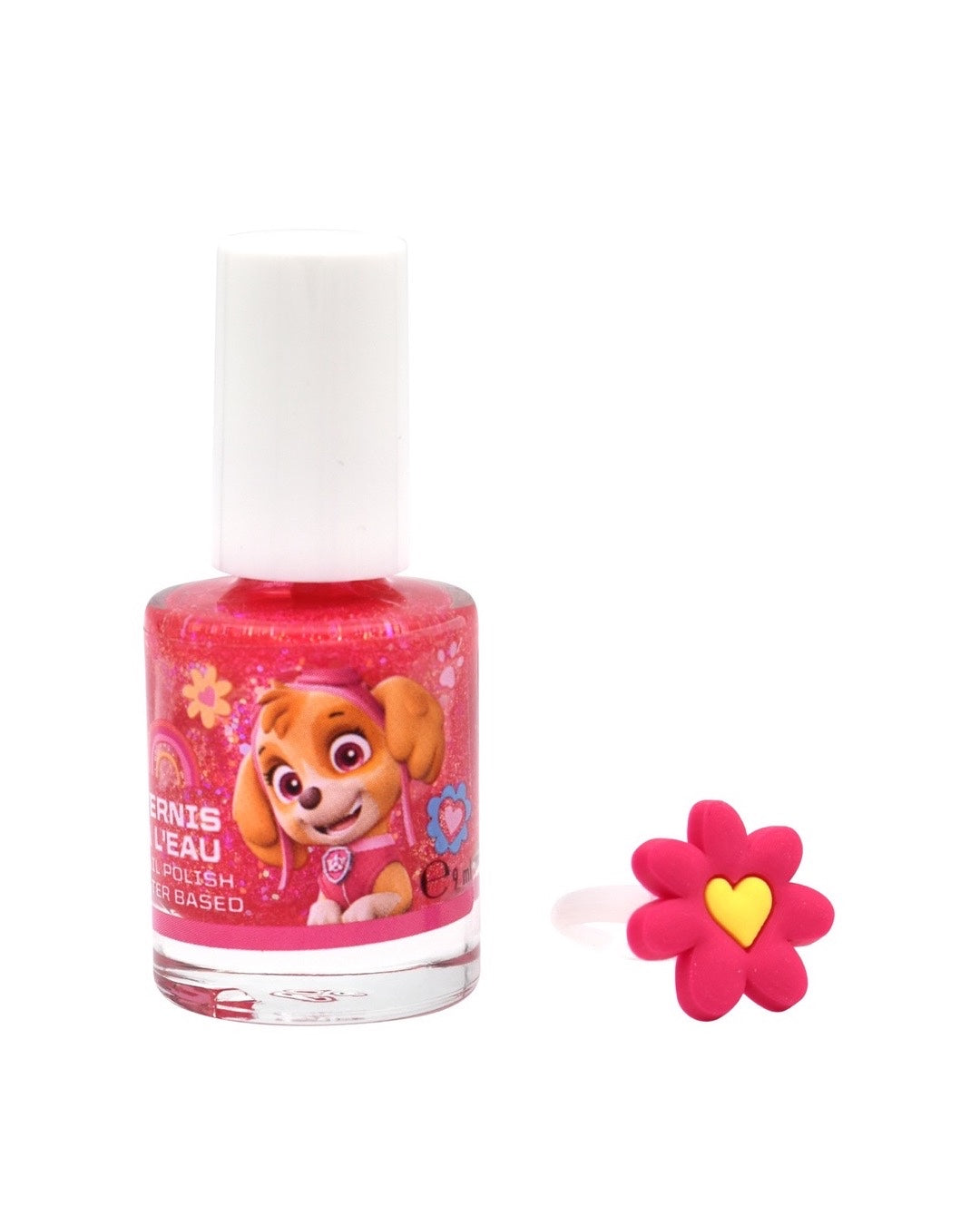 Flacon de vernis à l'eau La Pat' Patrouille rose pailleté de 9 ml à l'effigie du personnage de Stella, surmonté d'un bouchon blanc. À côté du flacon se trouve une bague ajustable pour enfant en silicone rose en forme de fleur avec un cœur jaune.