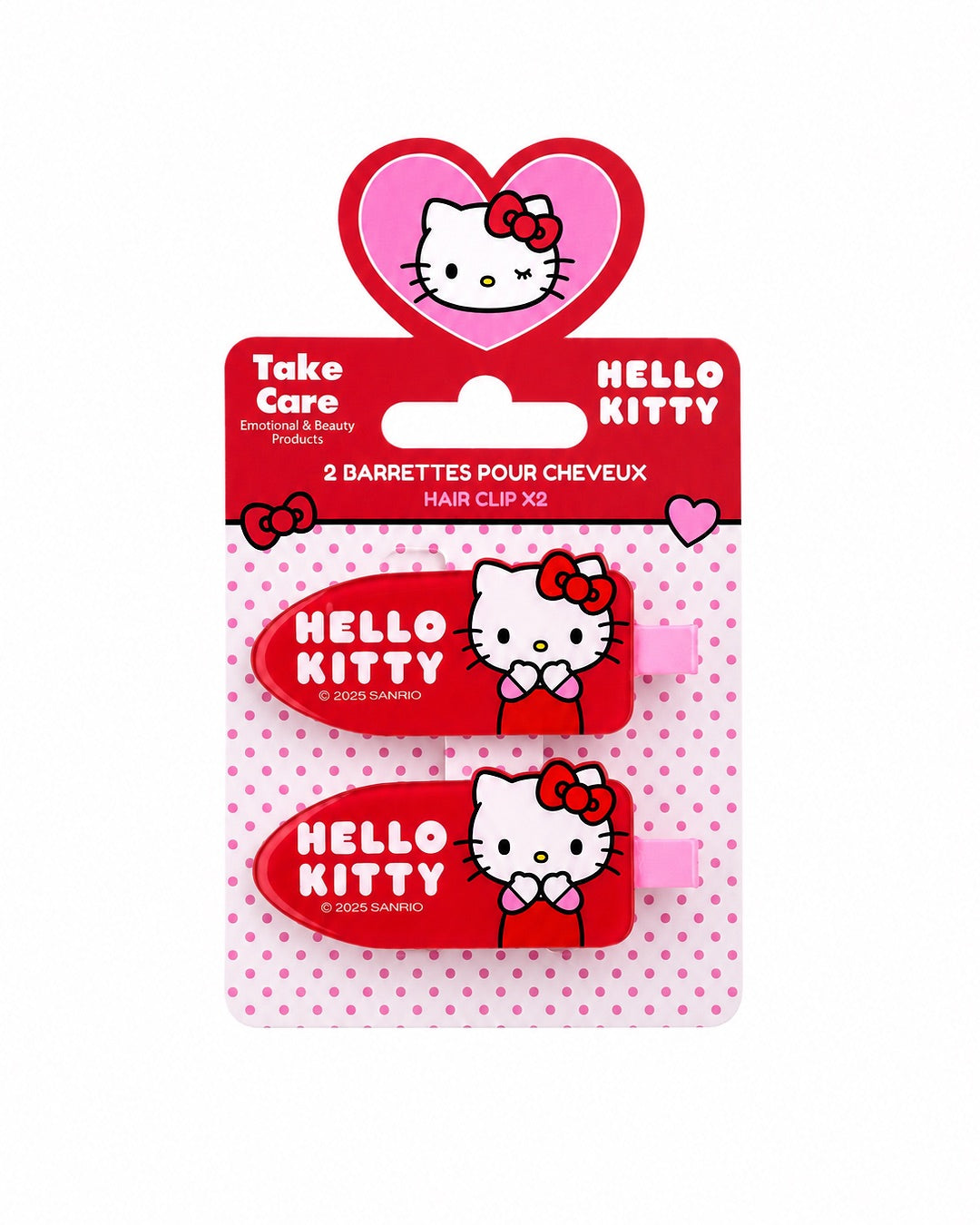 Lot de 2 barrettes pour cheveux Hello Kitty rouges présenté de face sur sa carte d’emballage officielle de la marque Take Care.