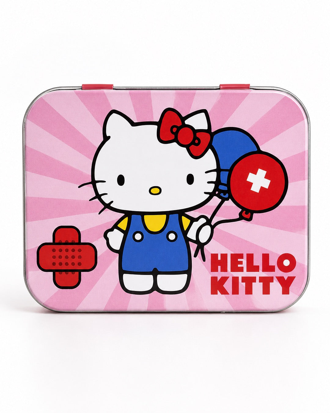 Vue de face d’une boîte en métal rose Hello Kitty contenant 24 pansements, illustrée avec la mascotte tenant des ballons médicaux.