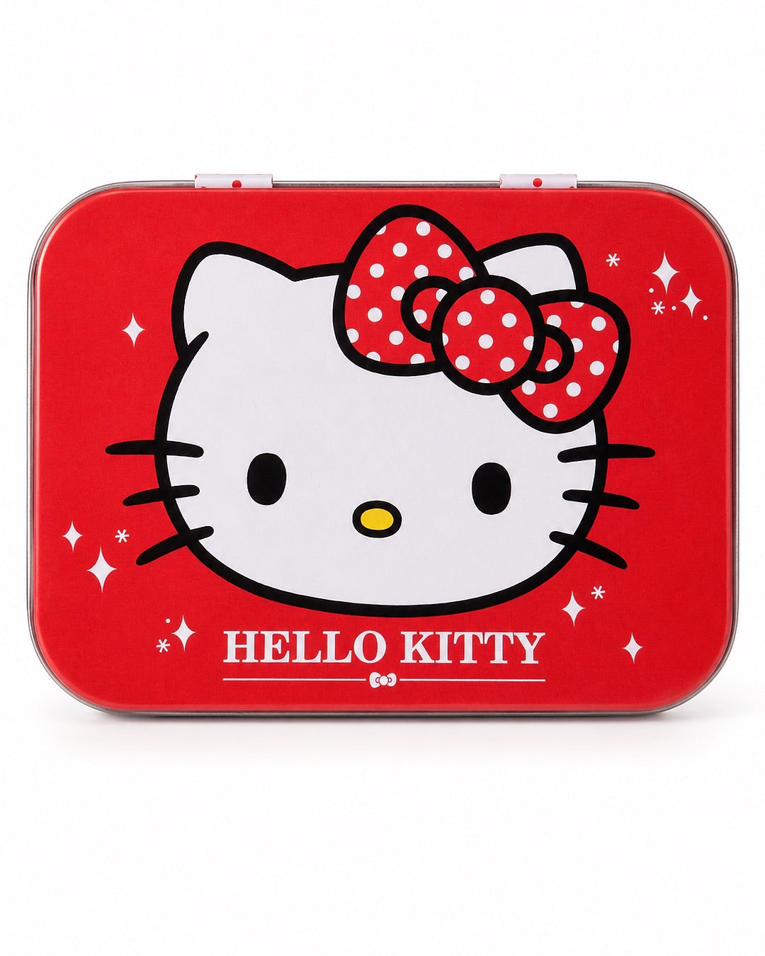 Vue de face d’une boîte en métal rouge Hello Kitty pour pansements pailletés, ornée d’un grand visage de la mascotte et d’étoiles scintillantes.