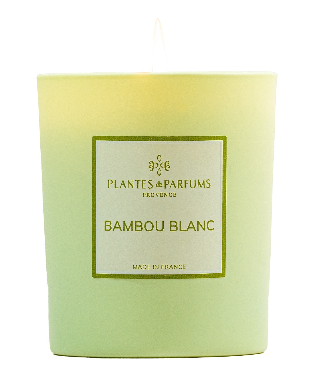 Bougie parfumée 180 g, fragrance Bambou blanc de Plantes & Parfums à la cire de soja dans un contenant en verre vert mat.