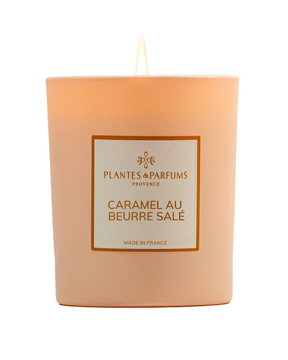 Bougie parfumée 180 g, fragrance Caramel beurre salé de Plantes & Parfums à la cire de soja dans un contenant en verre orange mat.