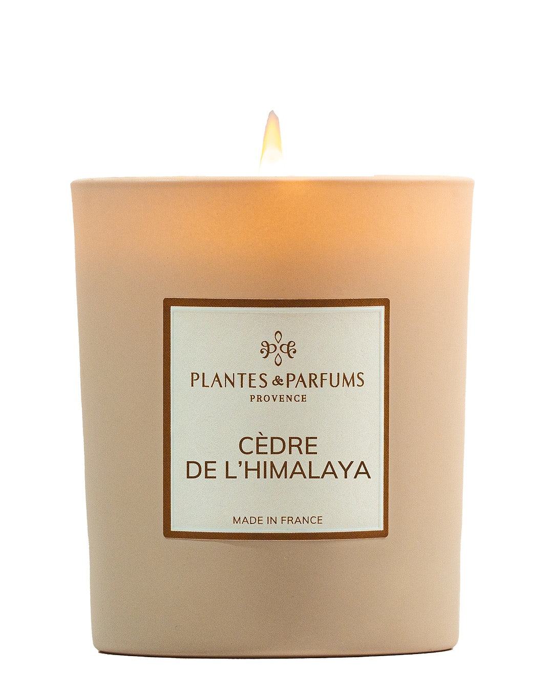 Bougie parfumée 180 g, fragrance Cèdre de l'Himalaya de Plantes & Parfums à la cire de soja dans un contenant en verre beige mat.