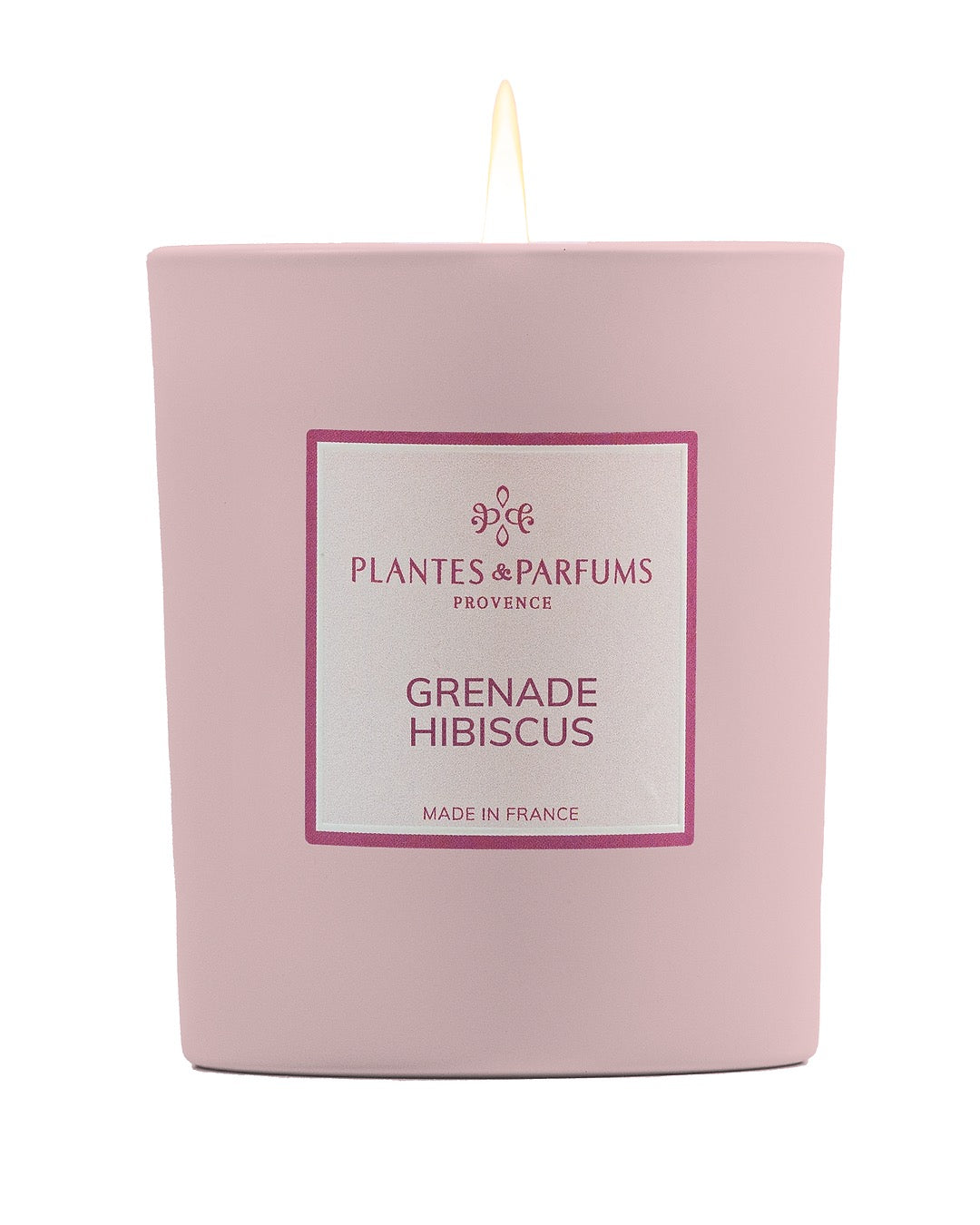 Bougie parfumée 180 g, fragrance Grenade & Hibiscus de Plantes & Parfums à la cire de soja dans un contenant en verre rose mat.