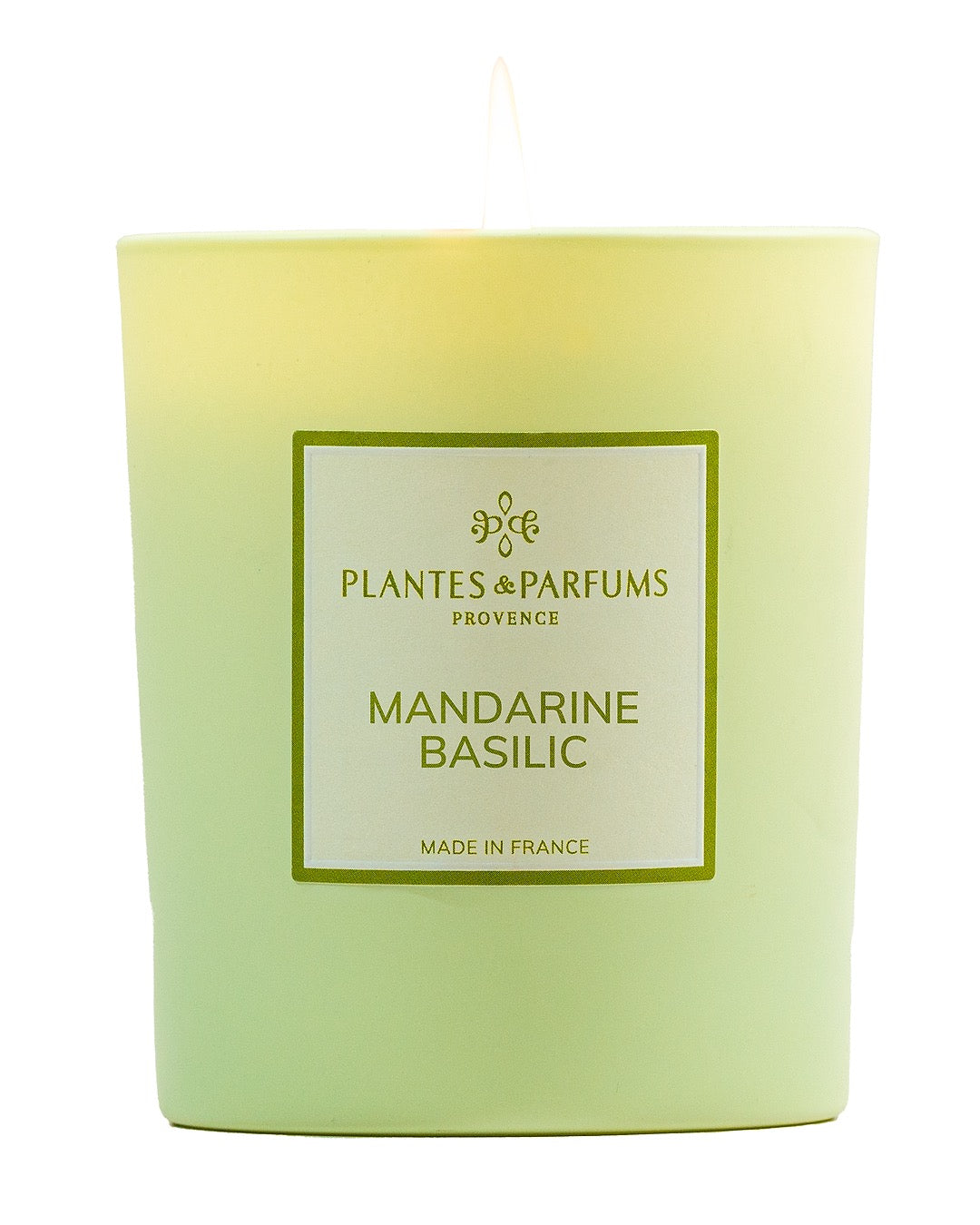 Bougie parfumée 180 g, fragrance Mandarine Basilic de Plantes & Parfums à la cire de soja dans un contenant en verre vert mat.
