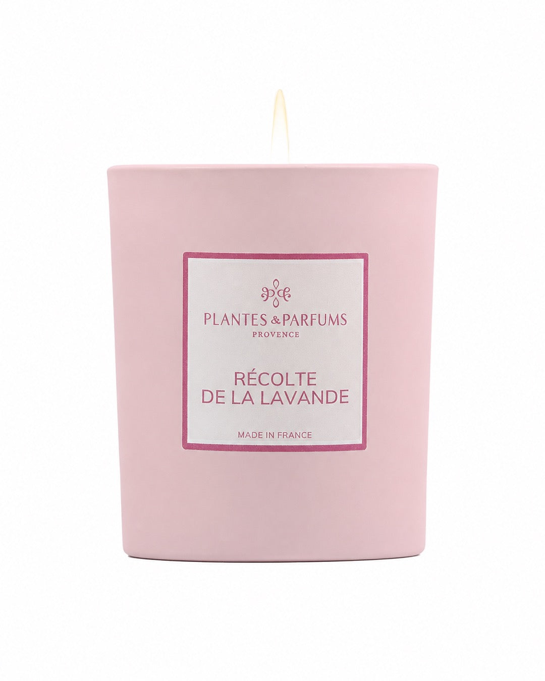 Bougie parfumée 180 g, fragrance Récolte de lavande de Plantes & Parfums à la cire de soja dans un contenant en verre rose mat.