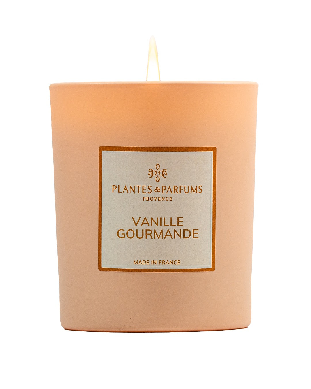 Bougie parfumée 180 g, fragrance Vanille Gourmande de Plantes & Parfums à la cire de soja dans un contenant en verre orange mat.
