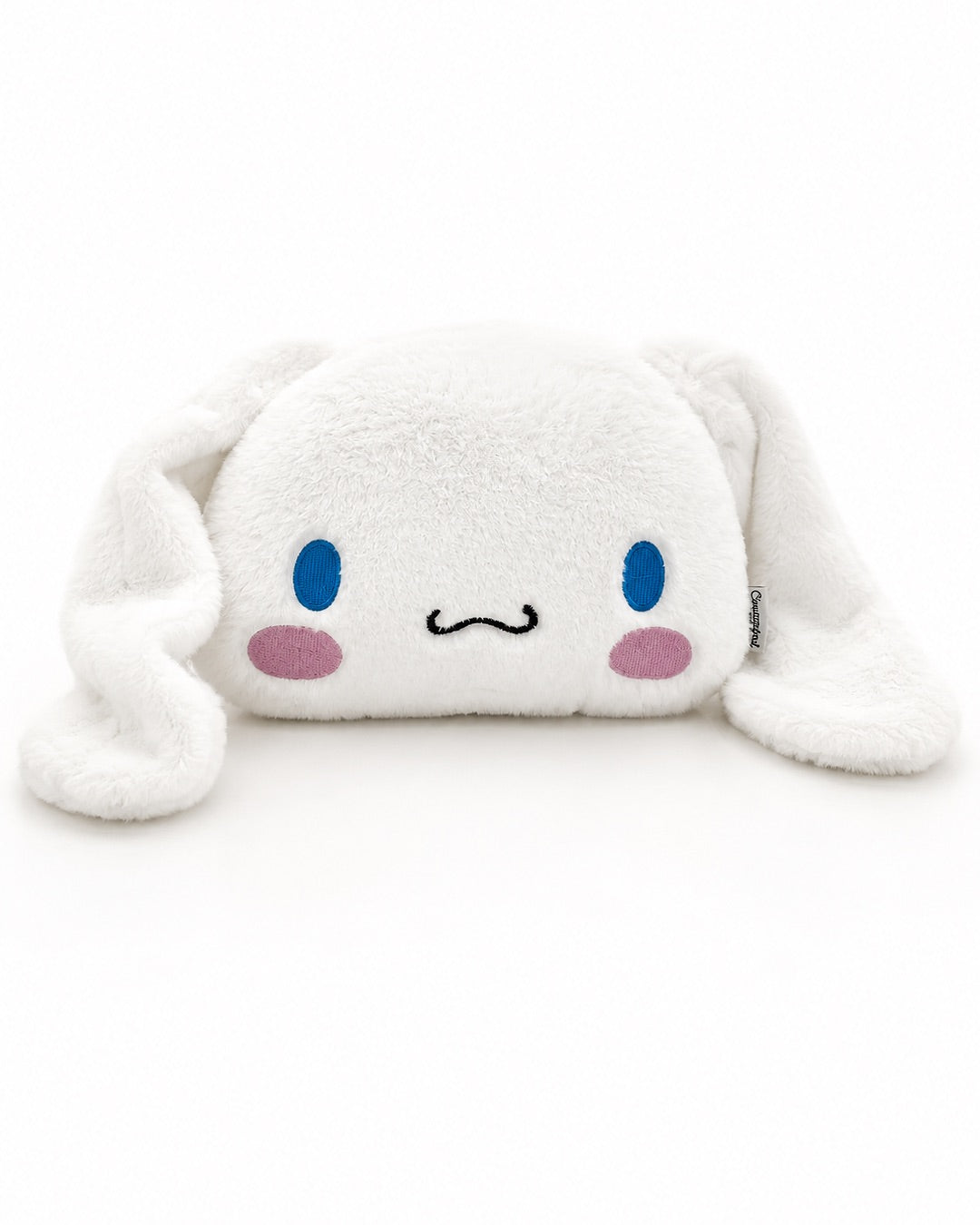Bouillotte en peluche 3D Cinnamoroll Sanrio faisant office de housse et de range-pyjama blanc.