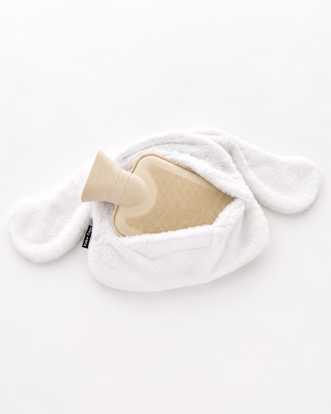 Bouillotte en peluche 3D Cinnamoroll Sanrio faisant office de housse et de range-pyjama blanc.