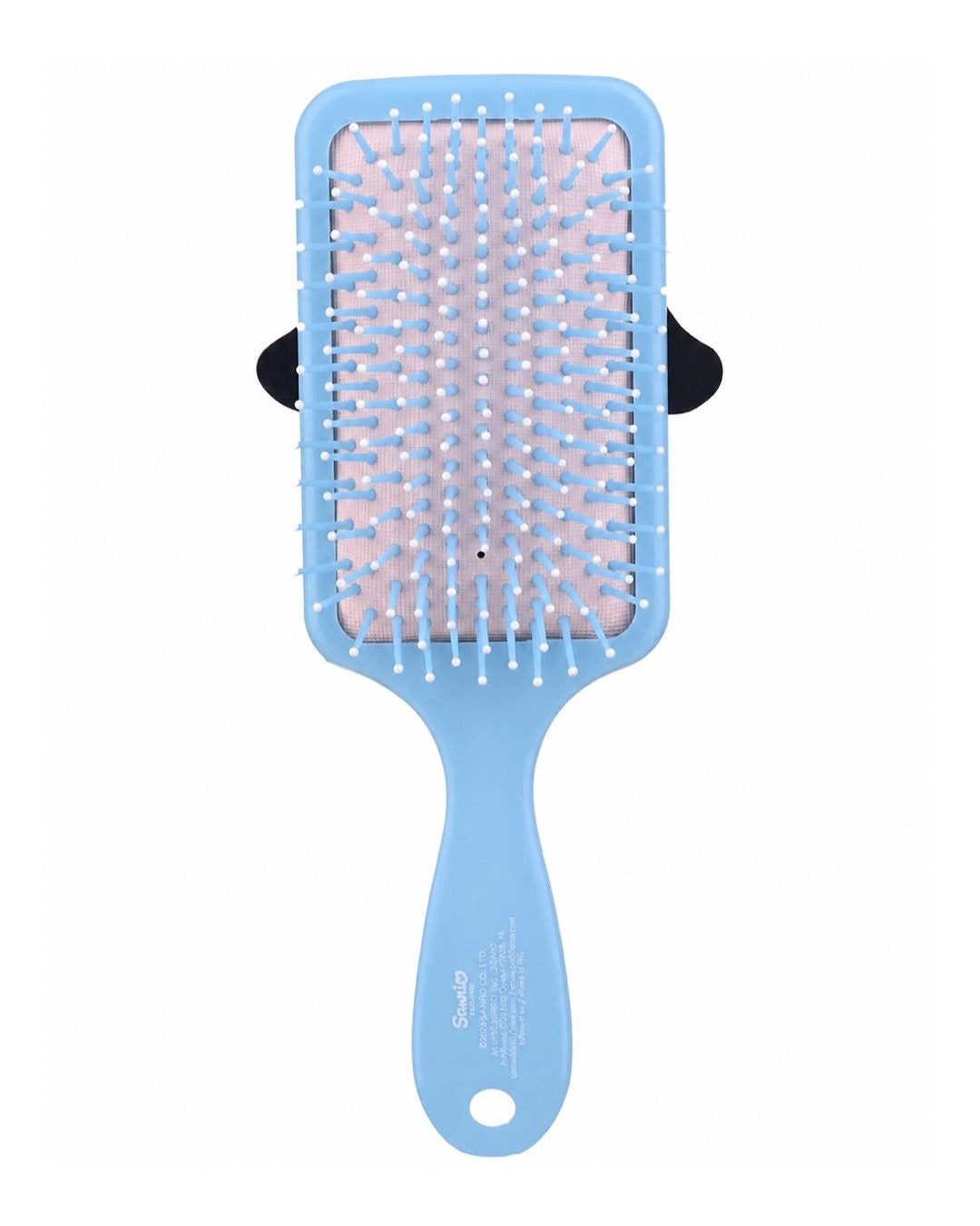 Brosse à cheveux rectangulaire bleu ciel avec des étoiles blanches et une grande figurine 3D en relief du personnage Cinnamoroll de Sanrio.
