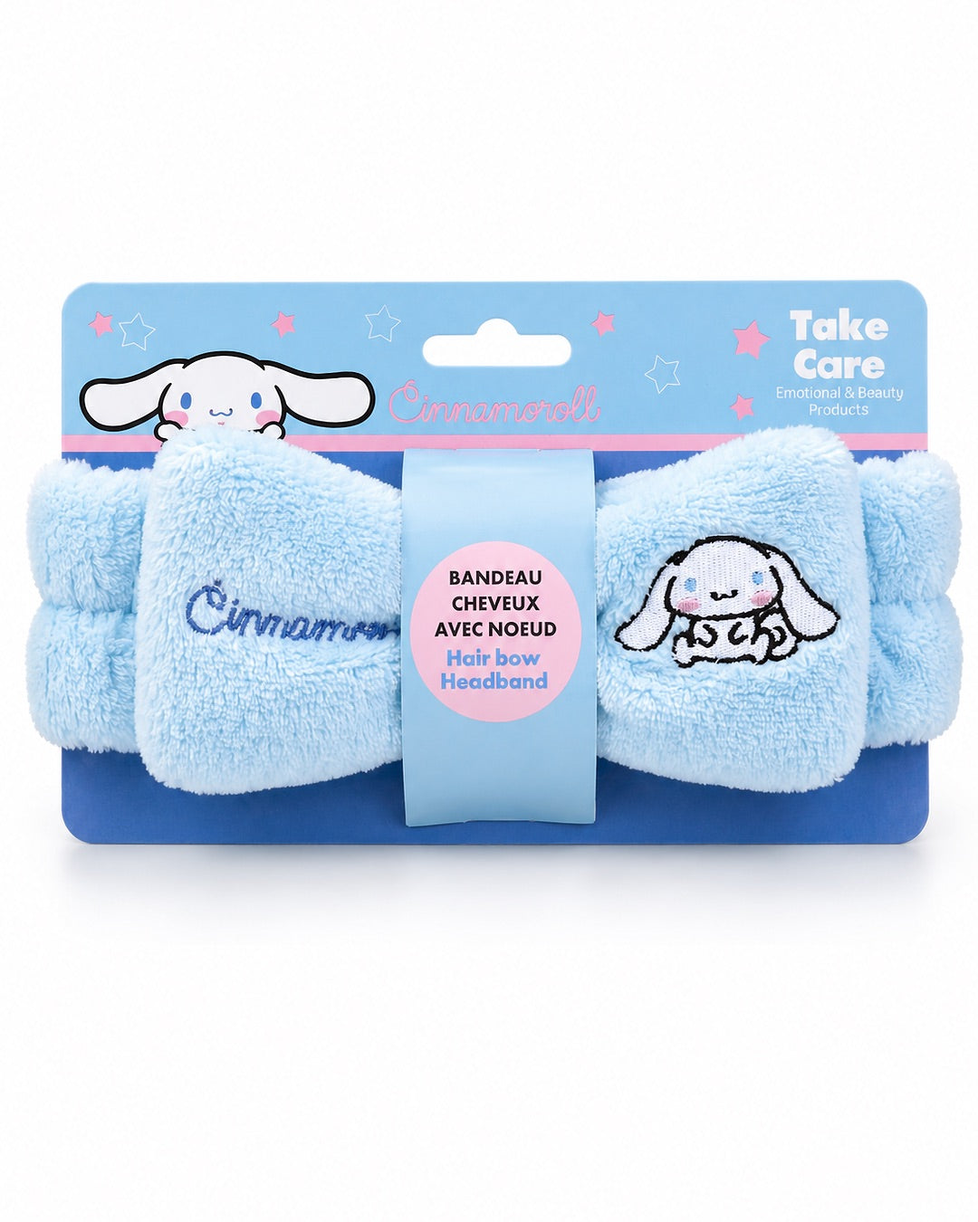 Bandeau de tête élastique en peluche bleu ciel avec un grand nœud central brodé du nom et du personnage Cinnamoroll de Sanrio.