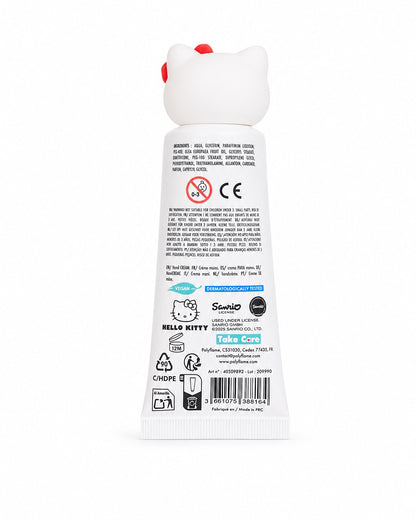 Vue arrière du tube blanc de crème pour les mains inclus dans le coffret Hello Kitty, affichant la liste des ingrédients, le code-barres, le logo officiel Sanrio et les mentions végan et testé dermatologiquement.