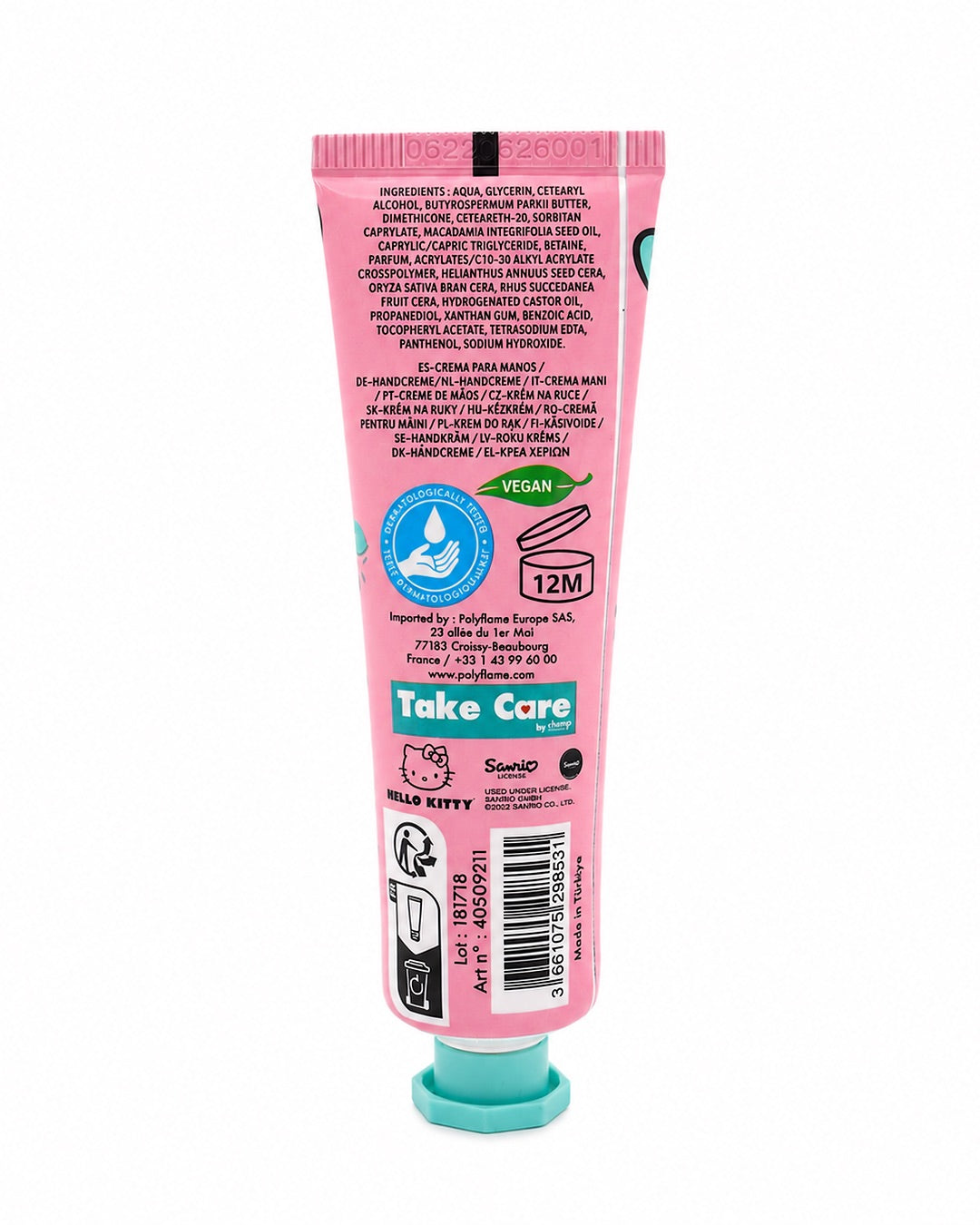 Vue arrière du tube de crème pour les mains Hello Kitty à la fraise, montrant la liste des ingrédients, le logo végan, le code-barres et les informations du fabricant.