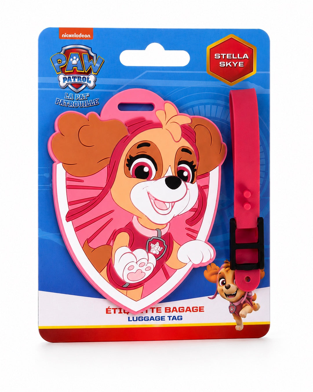 Emballage cartonné bleu officiel de l'étiquette à bagage La Pat' Patrouille représentant Stella la chienne aviatrice. La boîte comporte les mentions bilingues Étiquette Bagage / Luggage Tag ainsi que le badge rouge Stella / Skye.