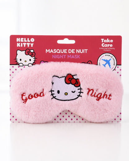 Masque de nuit Hello Kitty sur sa carte d’emballage d’origine rouge et blanche avec mentions officielles Sanrio Take Care pour le voyage.