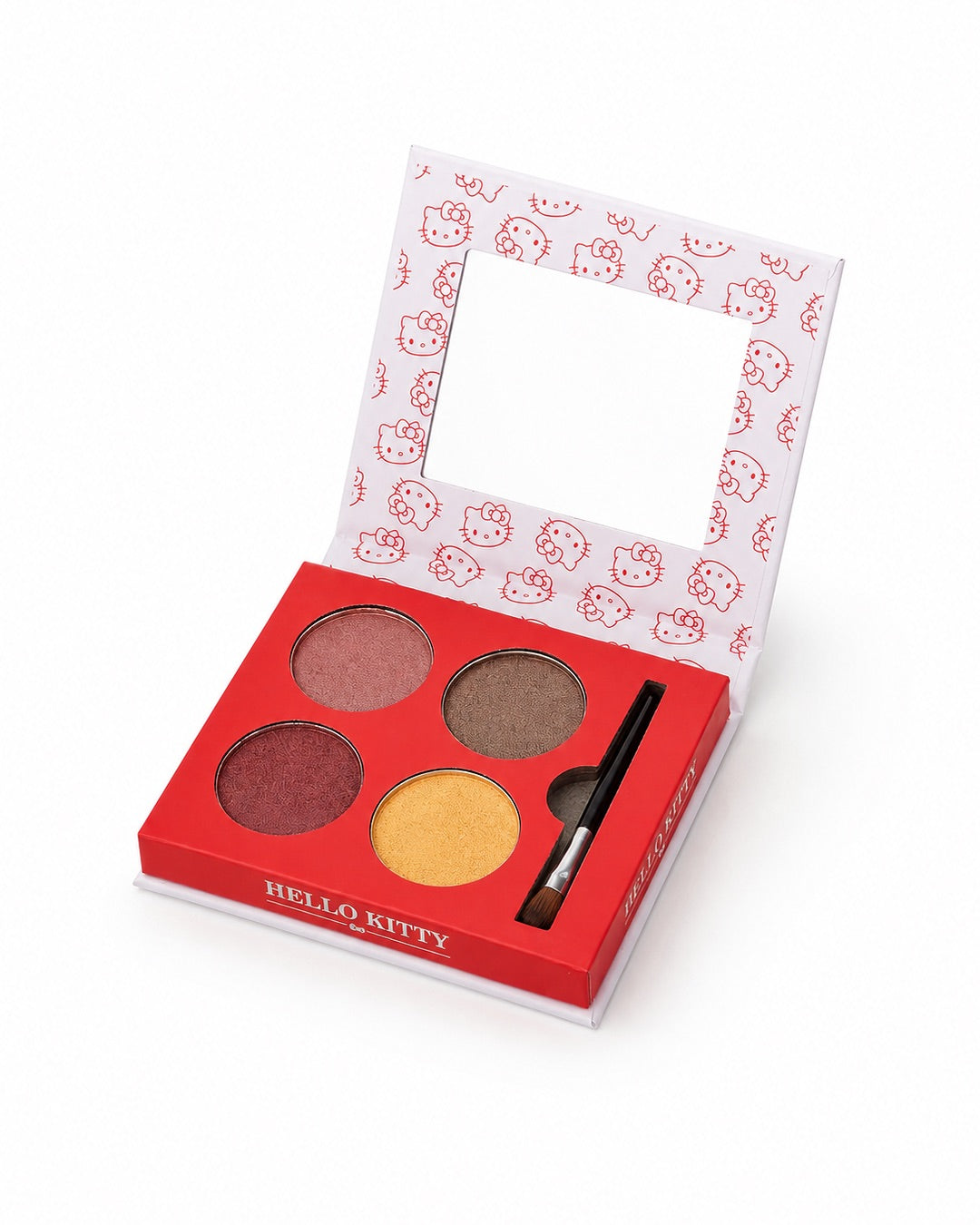 Palette de maquillage Hello Kitty ouverte révélant quatre fards circulaires aux teintes marron et dorée, un petit pinceau applicateur et un miroir intégré.