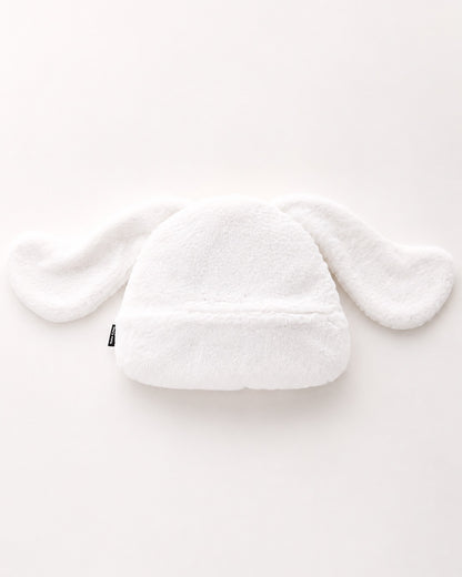 Bouillotte en peluche 3D Cinnamoroll Sanrio faisant office de housse et de range-pyjama blanc.